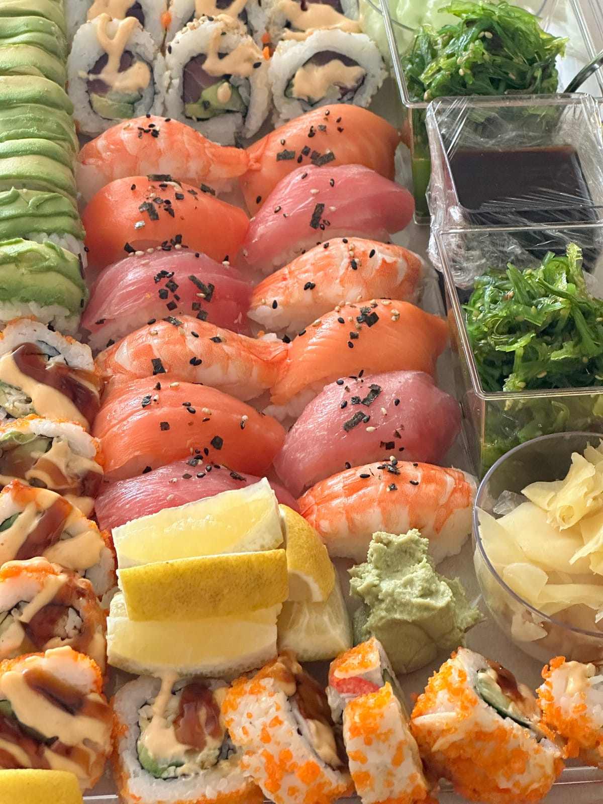 Got Sushi board with assorted sushi and sashimi