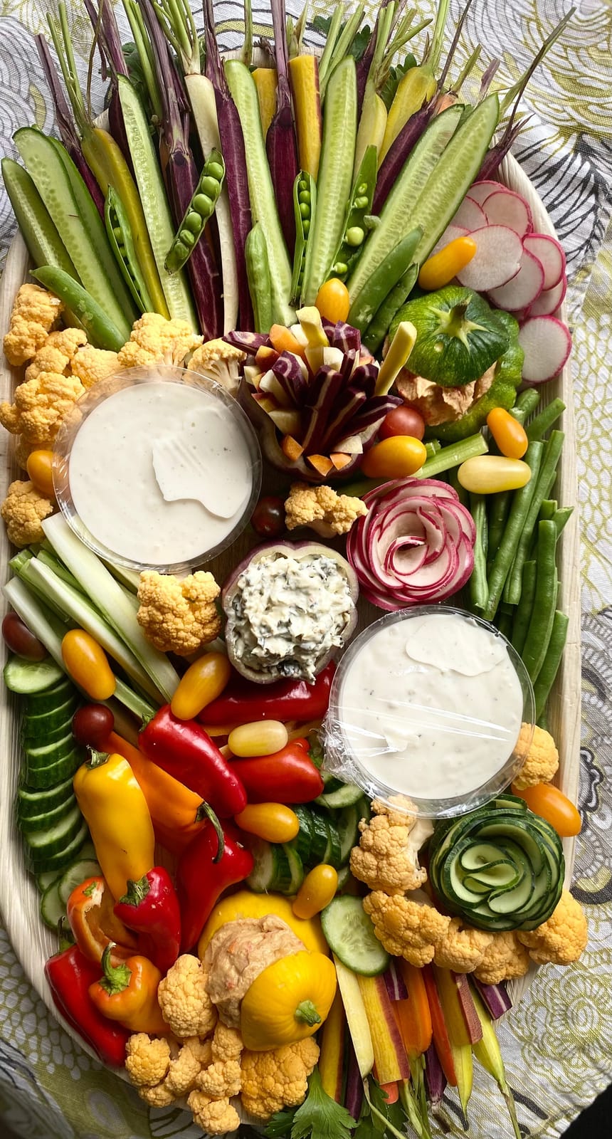 Seasonal crudités board with farmers-market vegetables and dips