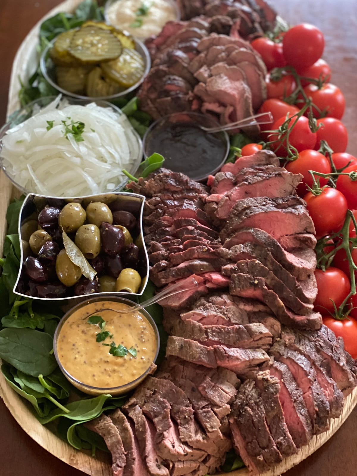 Heritage Angus beef tenderloin board, sliced, with condiments