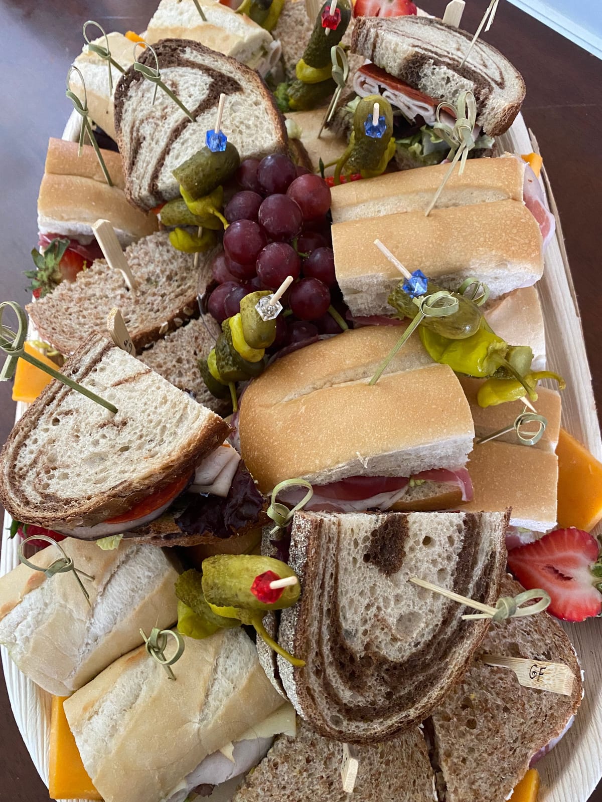 Artisan assorted sandwich board on fresh-baked breads
